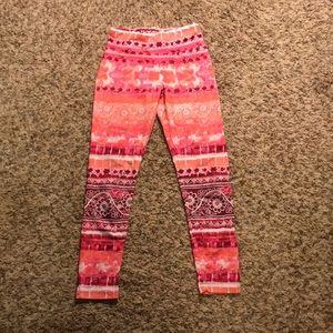Pink and orange leggings with Mandela design